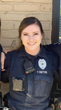 three female police officers posing for a photo